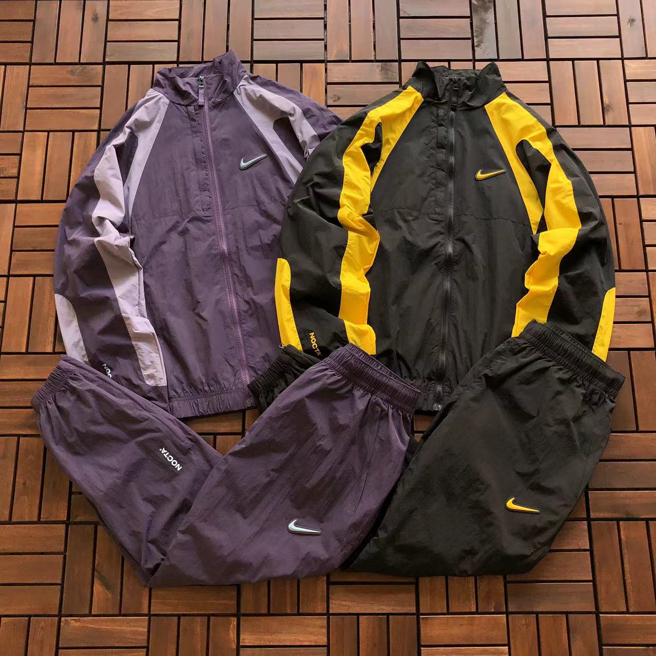 Conjunto Nike x NOCTA Woven Track Preto/Amarelo