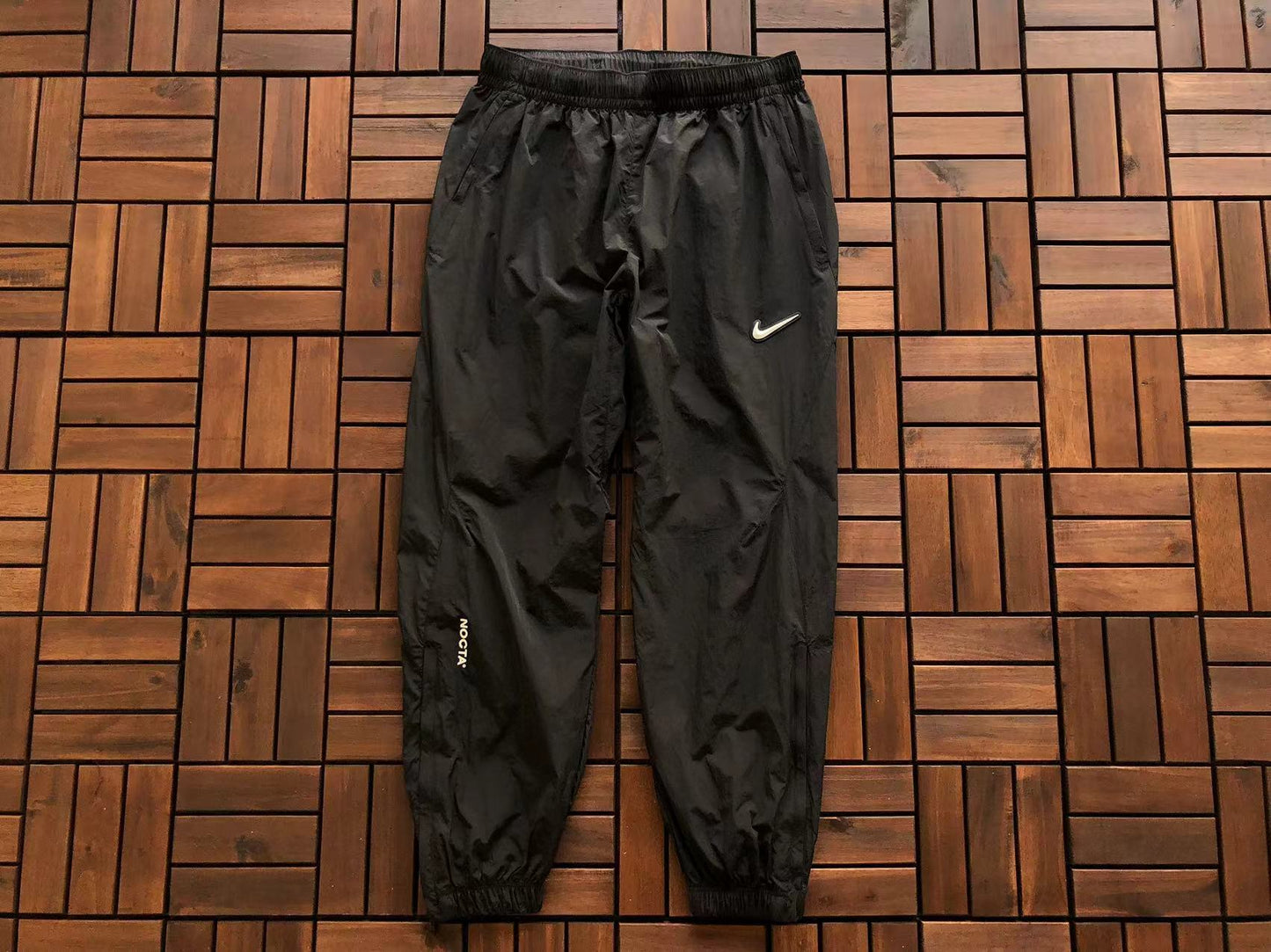 Calça Nike x NOCTA Woven Track Preta