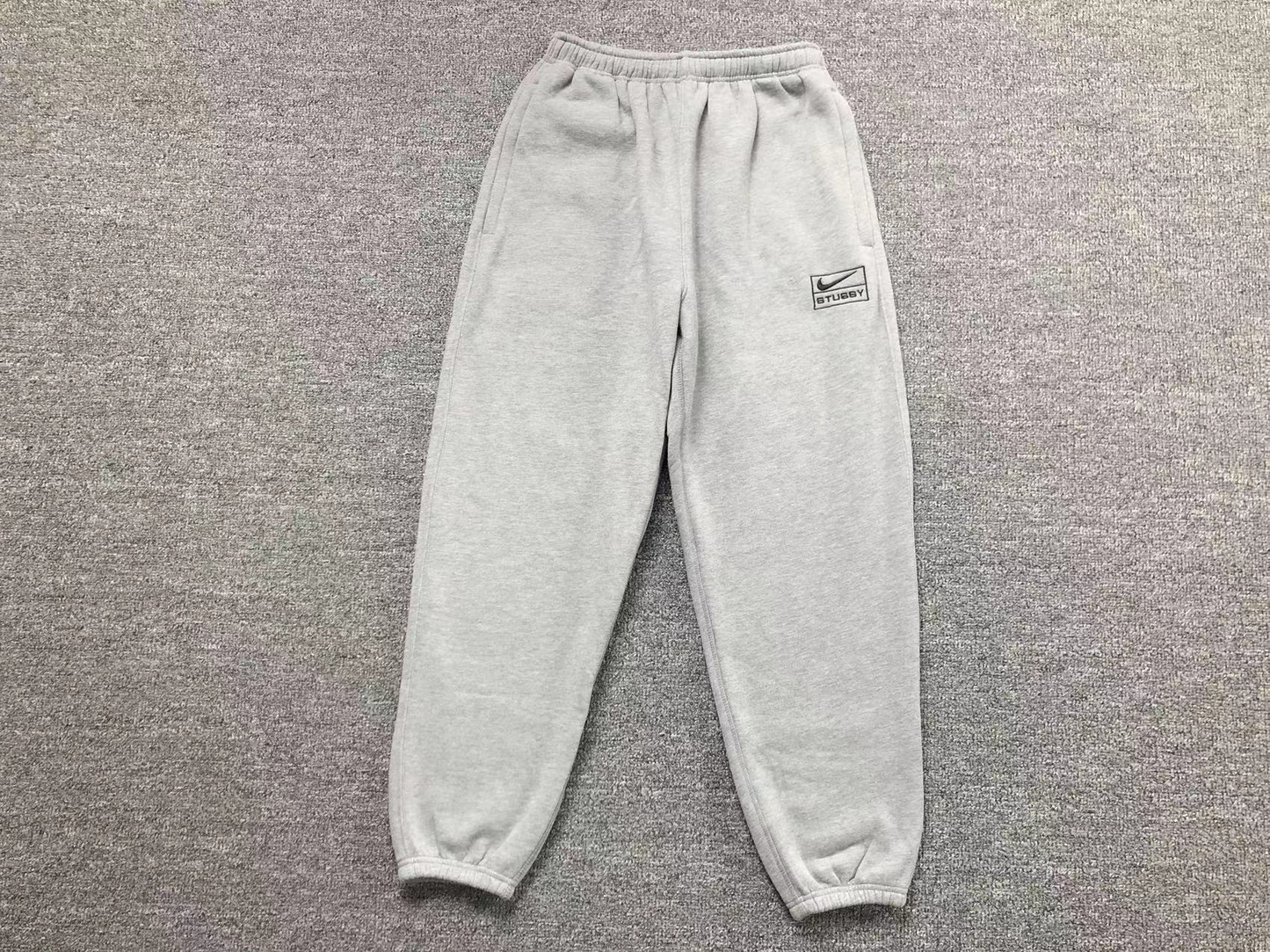 Calça Nike x Stussy Cinza